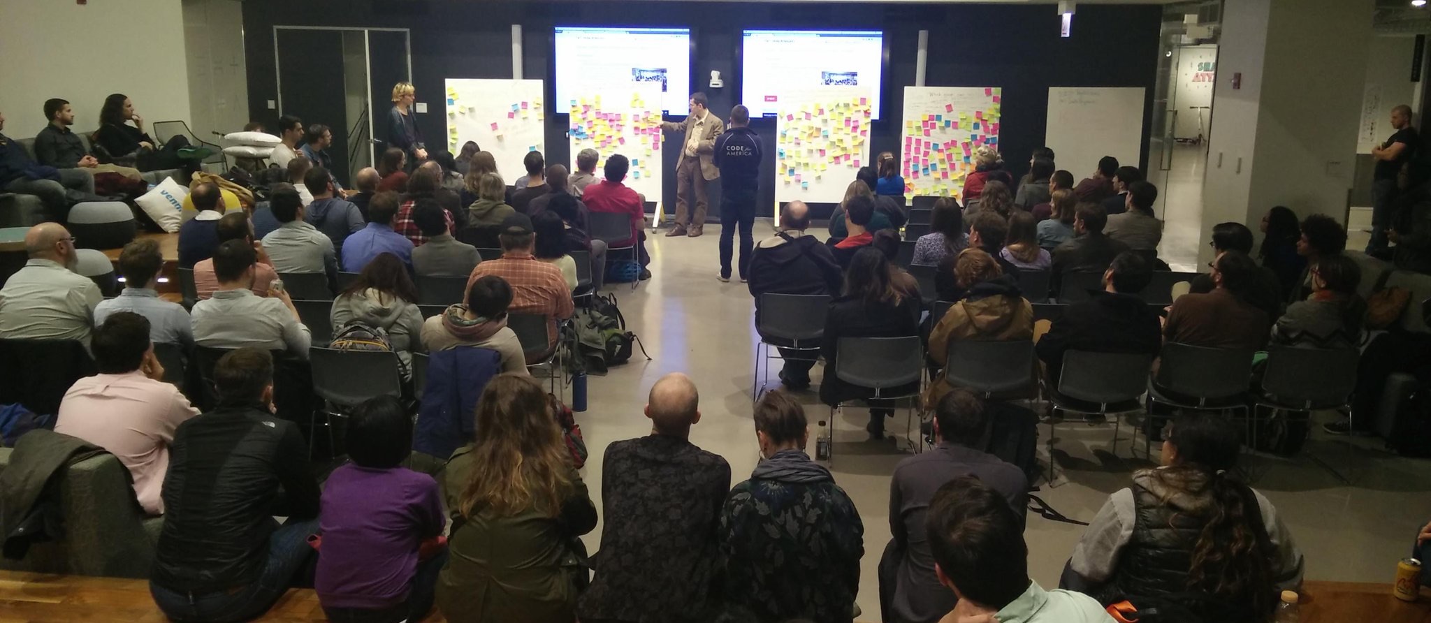 Reading out the results of the Post-election community feedback session at Chi Hack Night